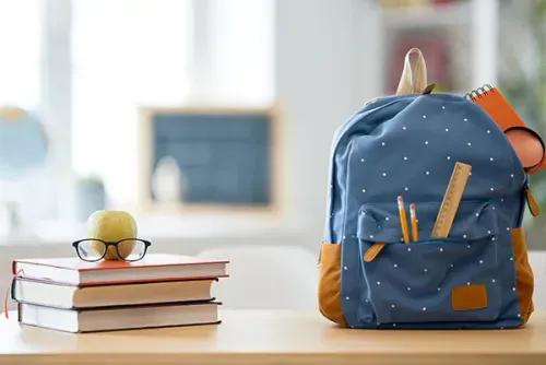 Kid's backpack on a desk