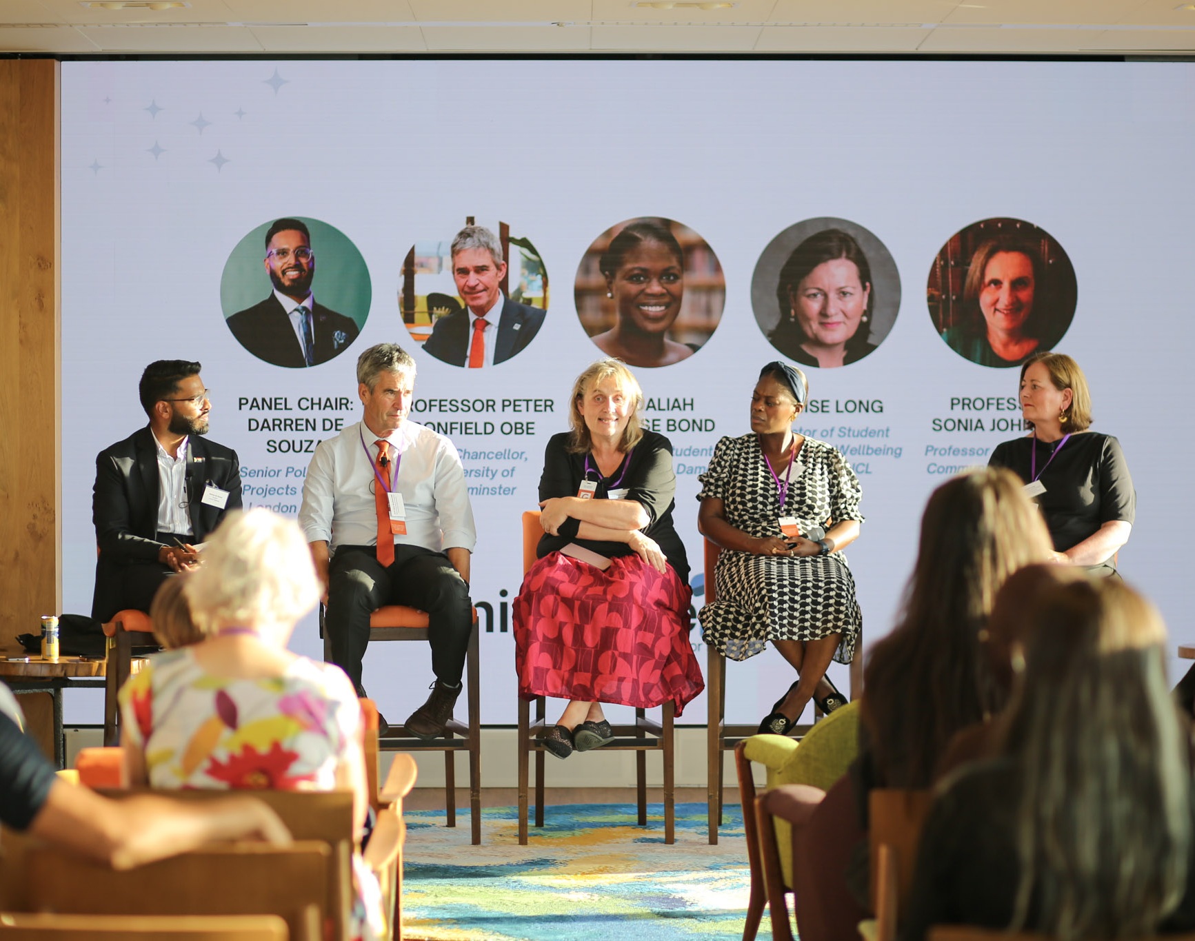 The panel speakers and chair discuss the future of student mental health support