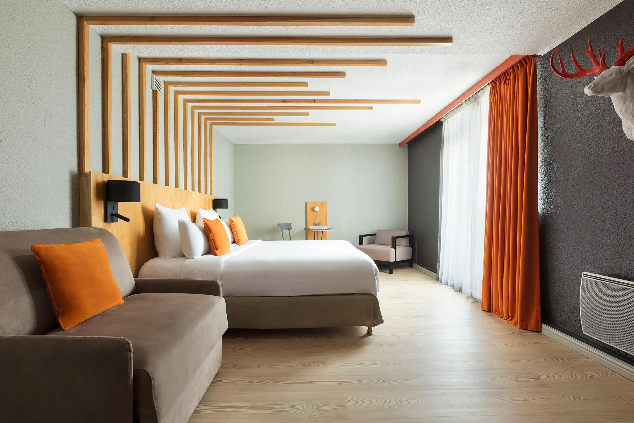 Suite Mont-Blanc à l'hôtel Les Aiglons à Chamonix, avec deux lits accolés pour un séjour en famille