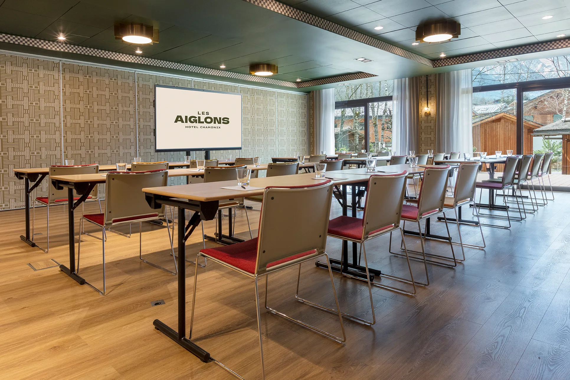 Spacious Davos room with modern equipment and flexible configuration for business meetings.