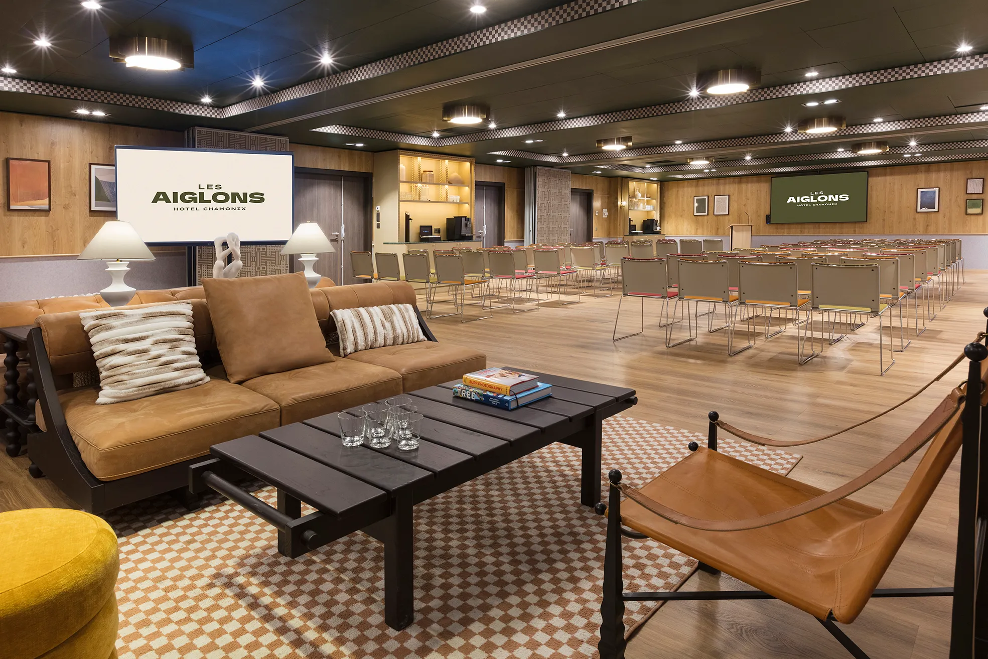 Bright seminar room with conference tables and modern decor.