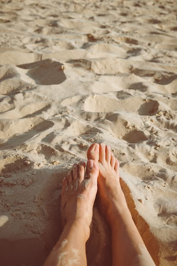 laying on sand