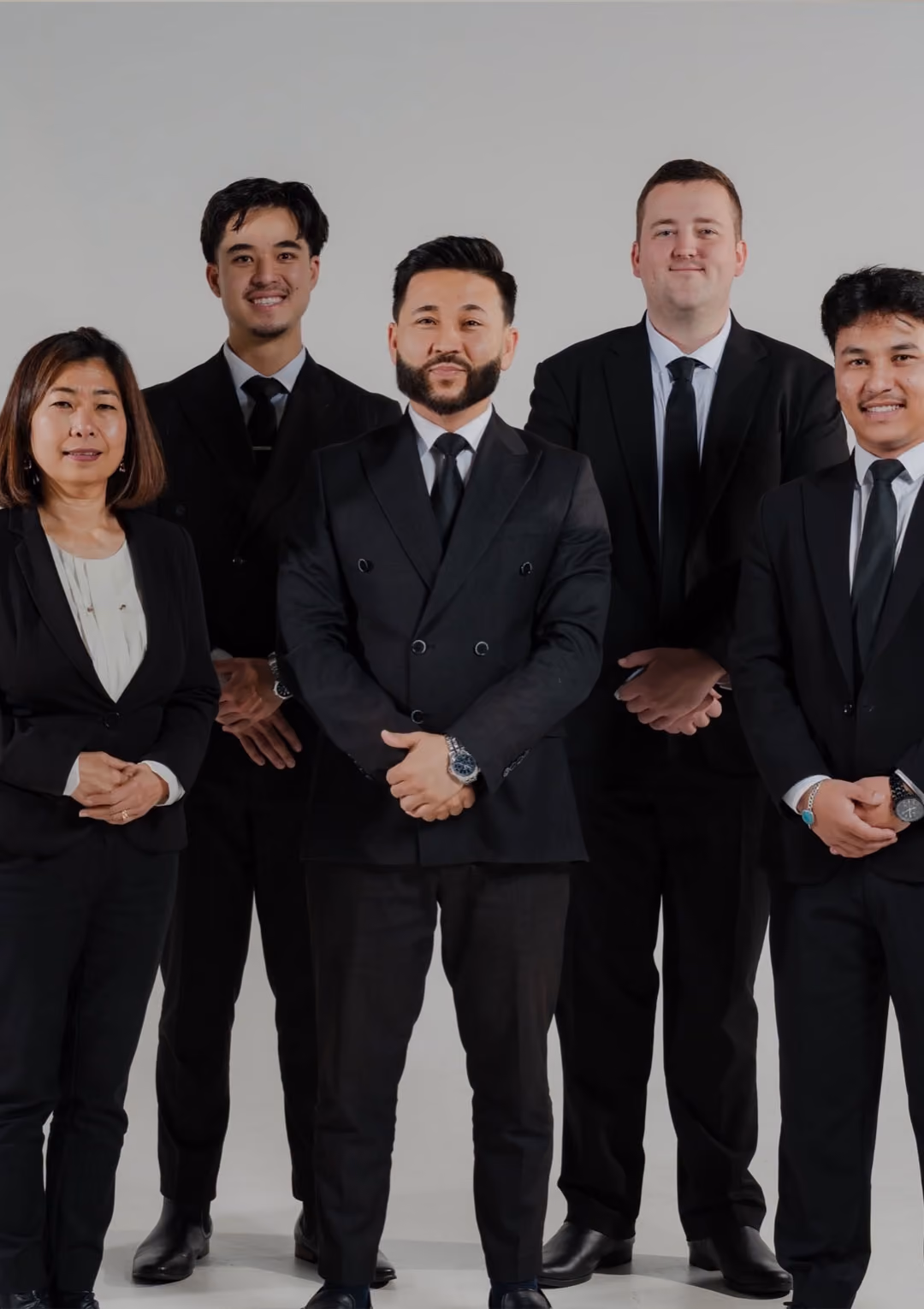 Real estate agency team posing for professional group photo