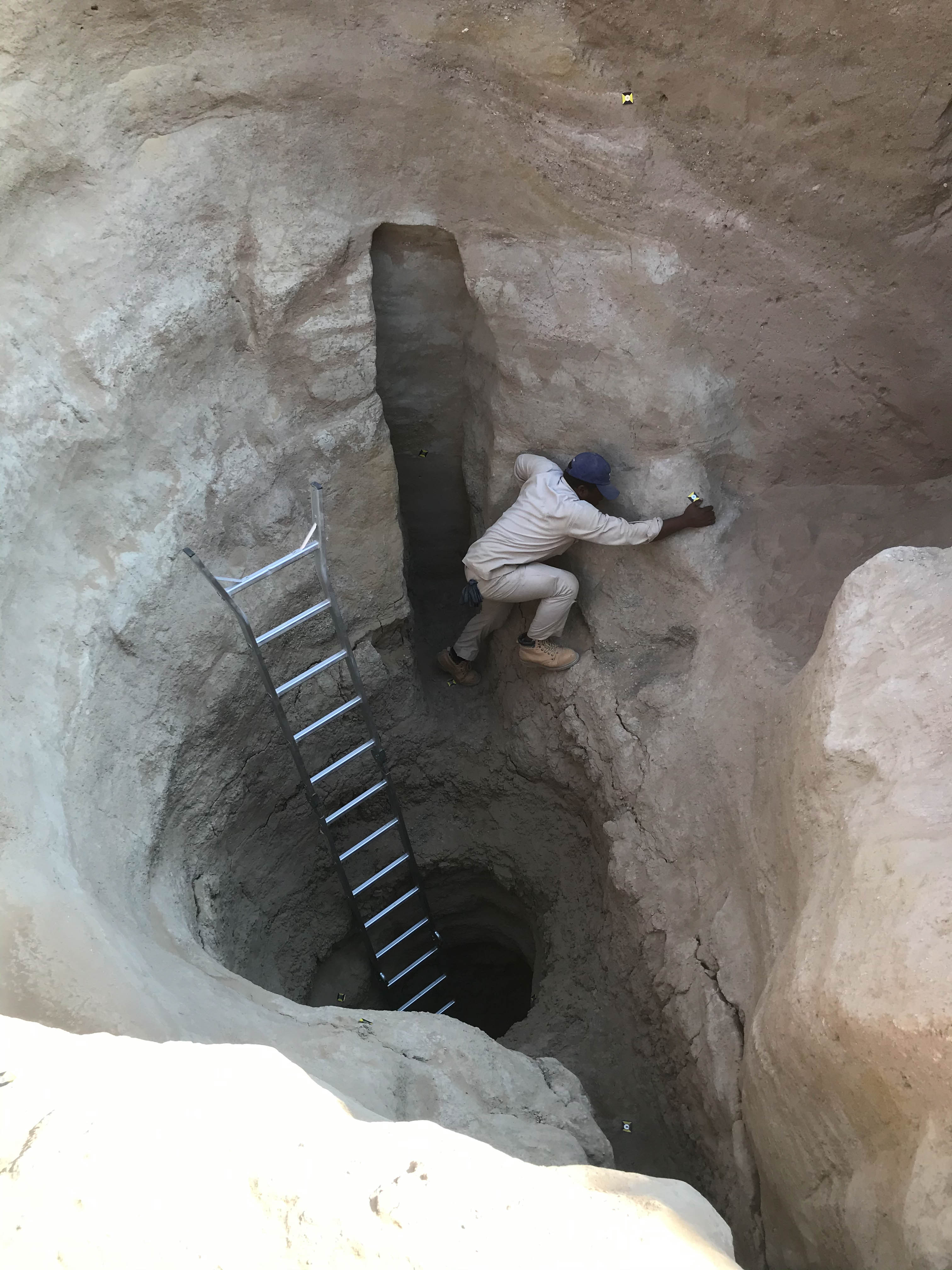 scale of human and object against the falaj shaft
