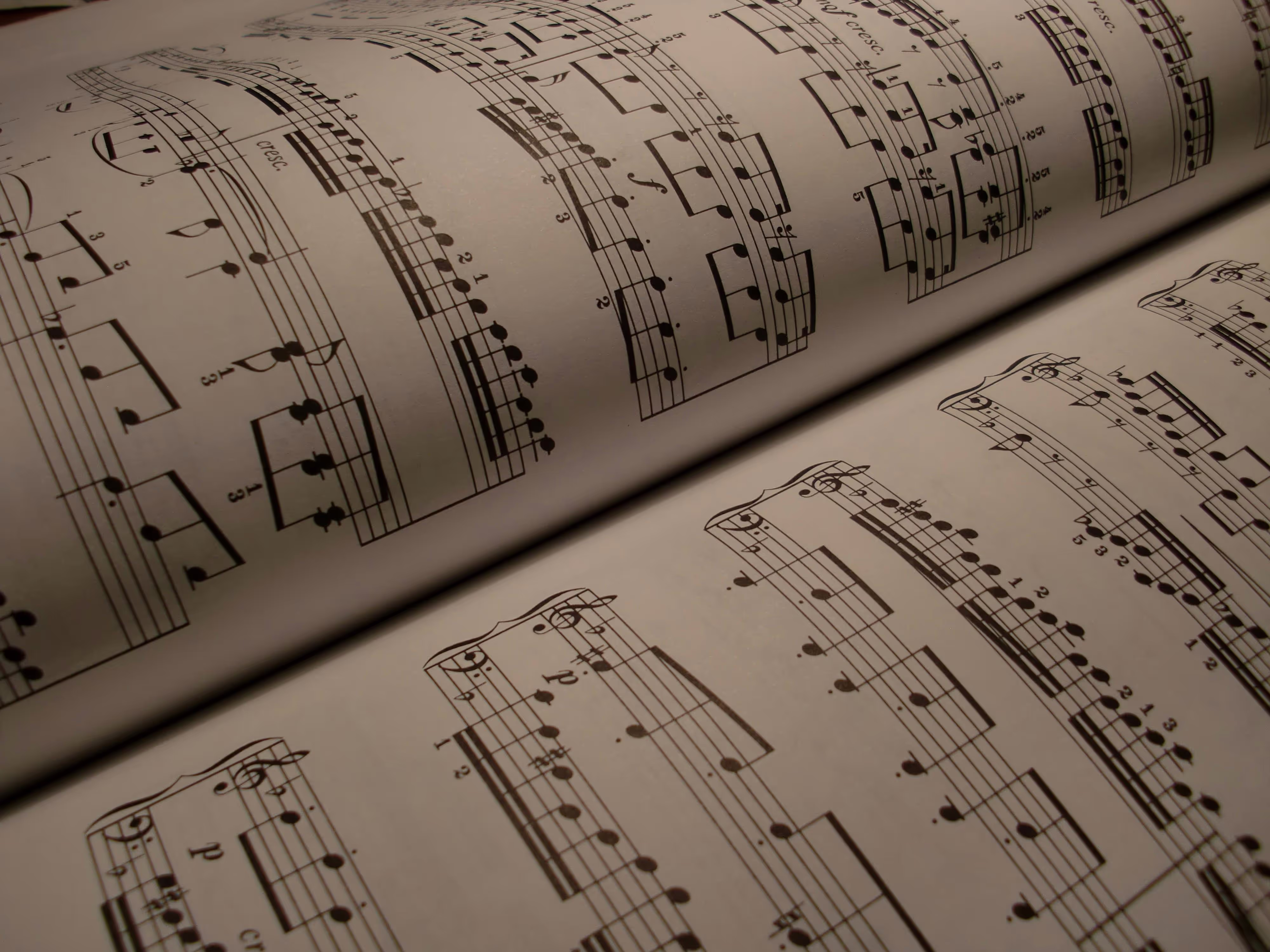 Picture of an open music score book 