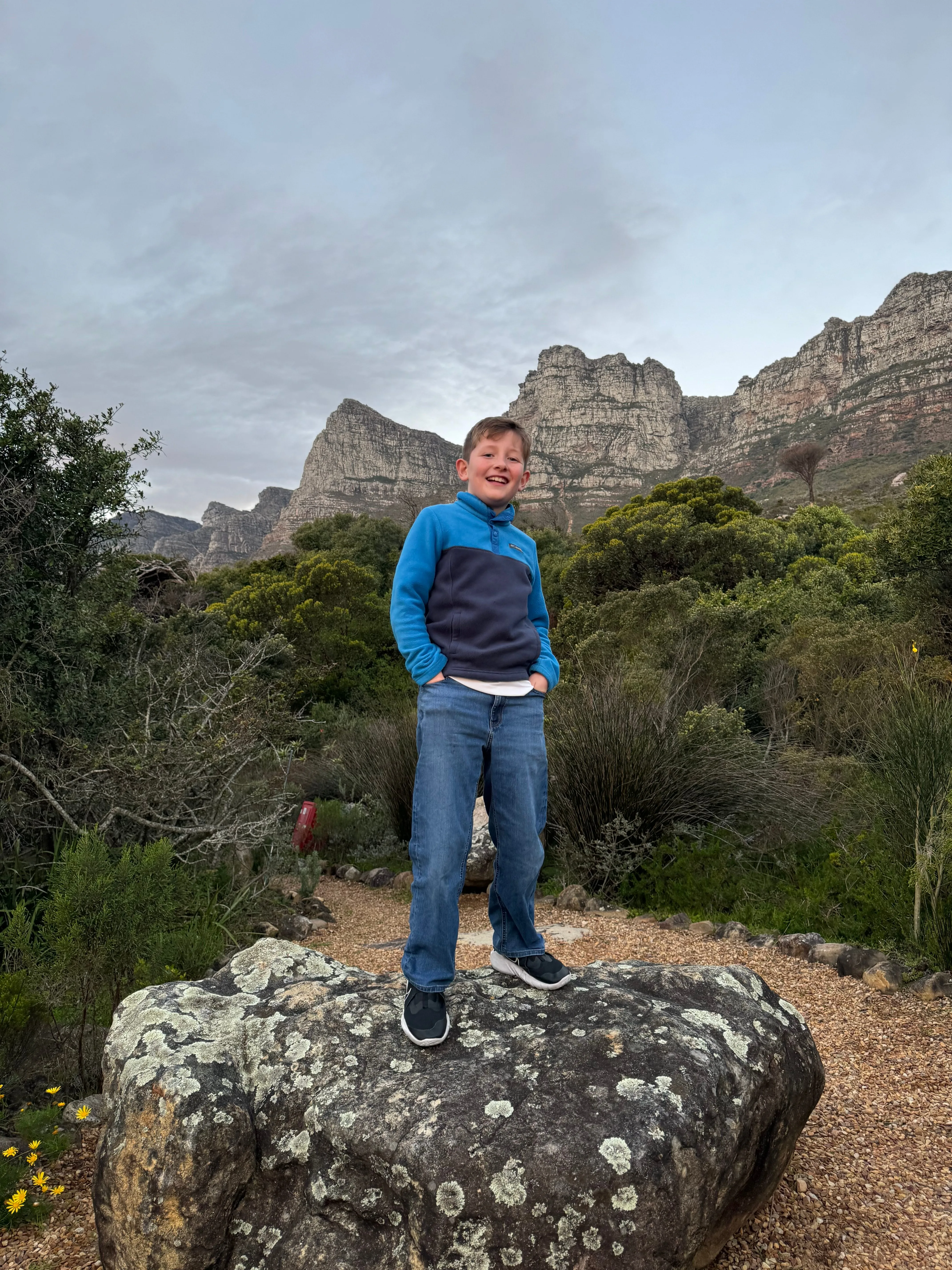 Maddoc standing on a rock
