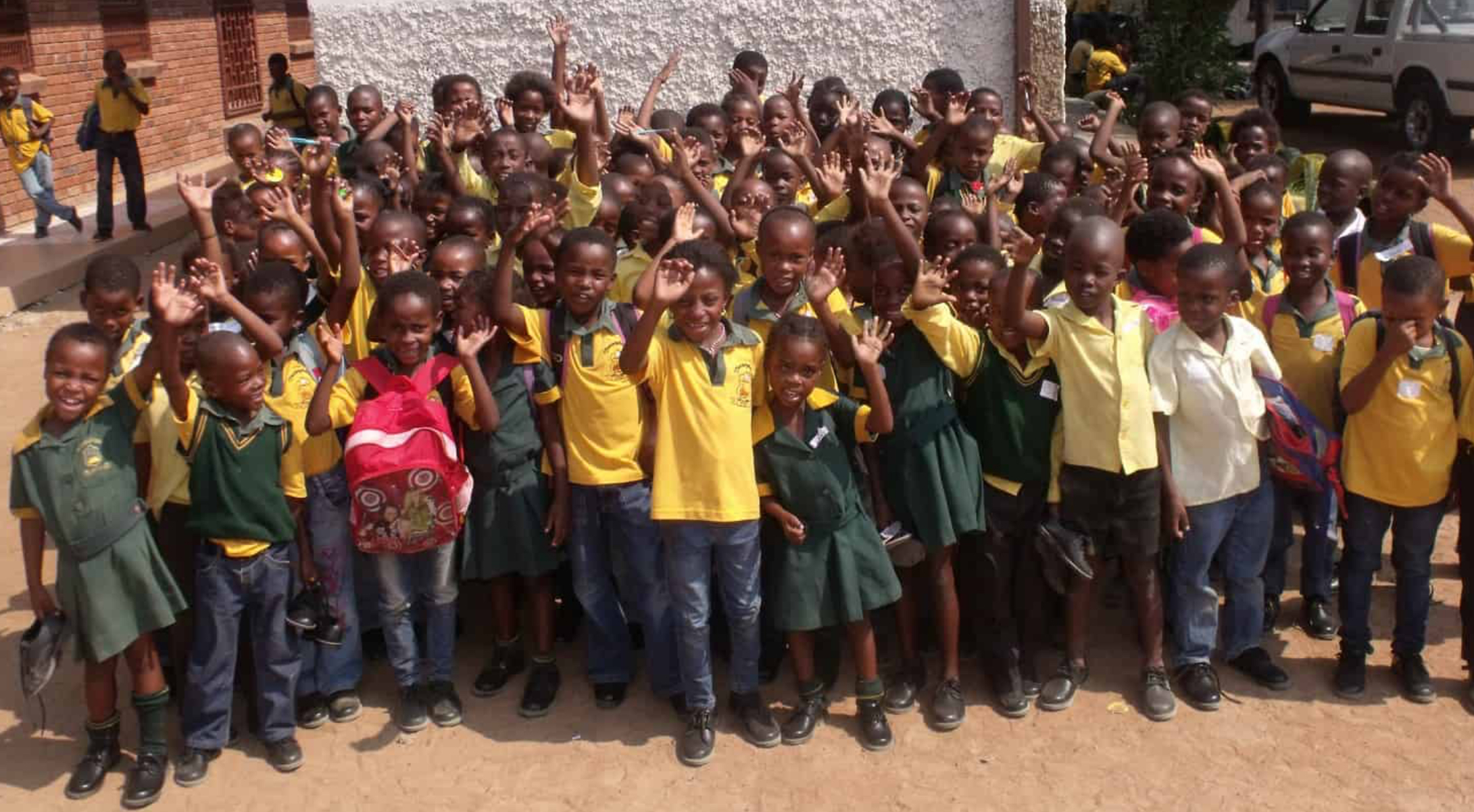 Primary school children in school uniform.
