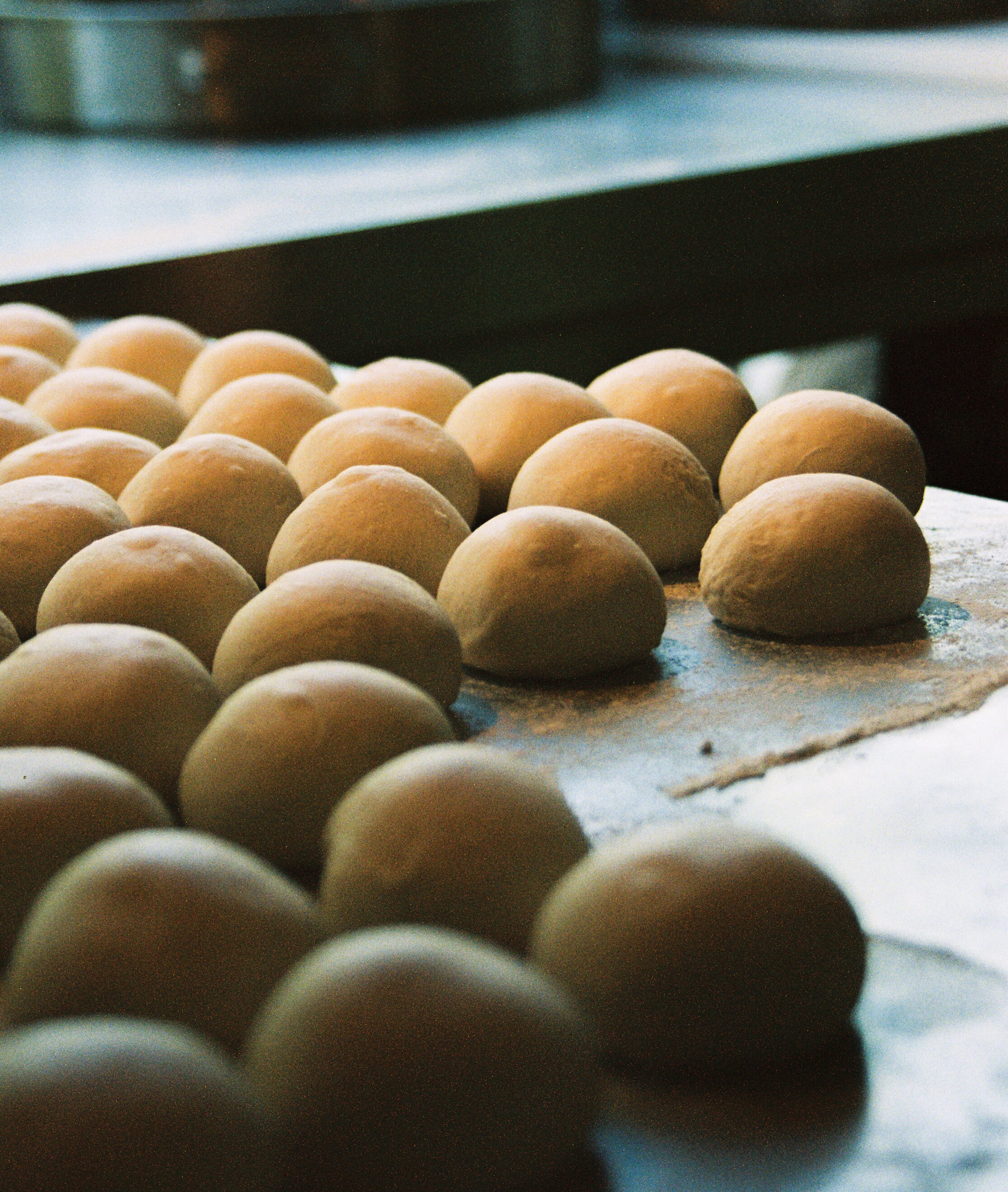 Bagel dough balls ready to be put in the oven