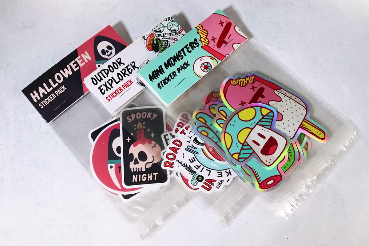 Stacks of different sticker packs on a white background