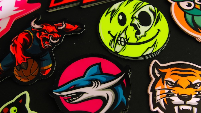 various fluorescent stickers die-cut in custom shapes