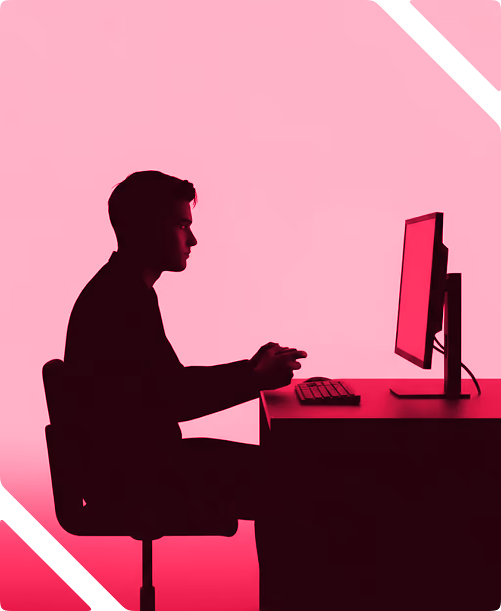 Silhouette of a man sitting at a desk using a computer with a pink background.