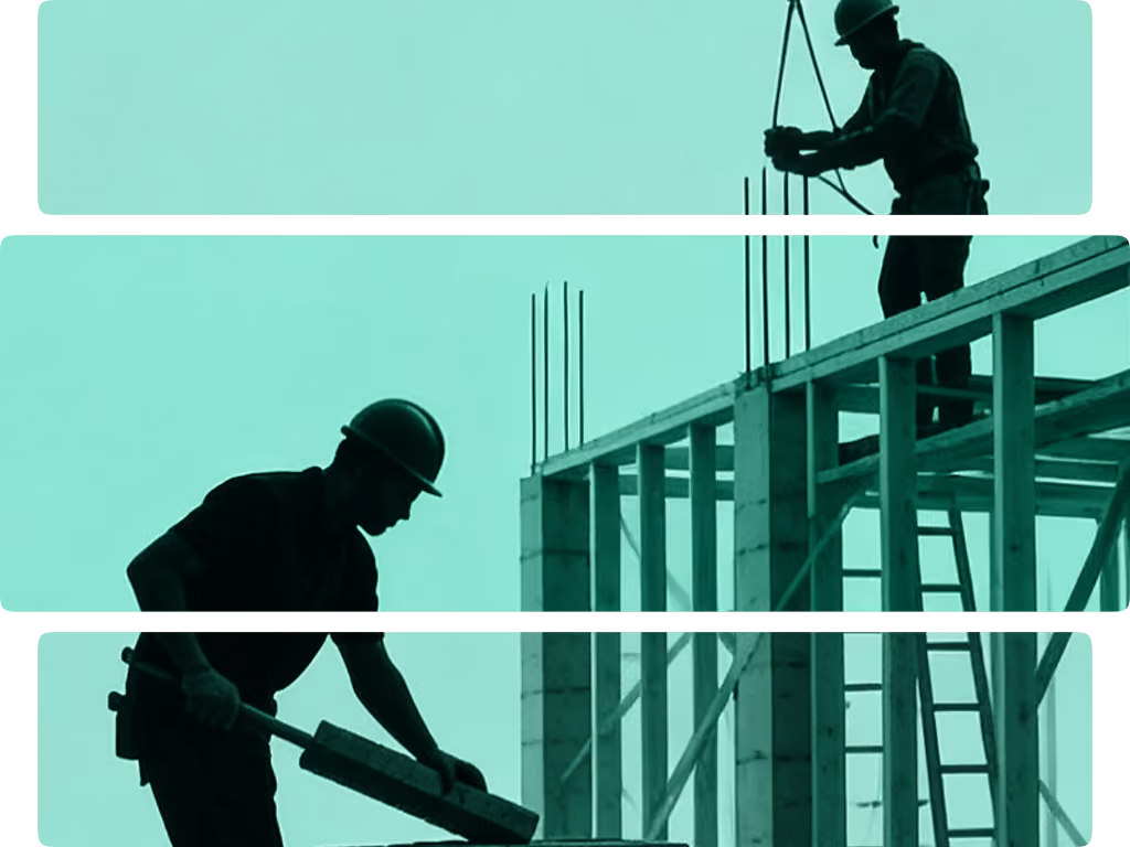 Silhouettes of two construction workers wearing helmets working on a building framework.
