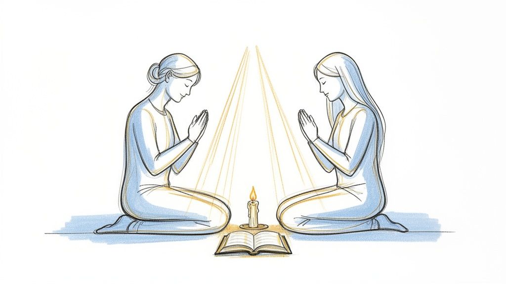 Two women kneel in prayer facing each other, a lit candle and open book between them.