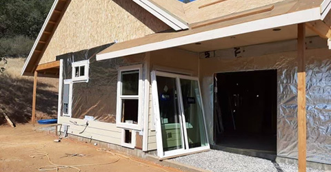 Radiant barriers are effective in reducing summer heat gain and cooling costs when installed in homes, typically in attics and on wall decking.