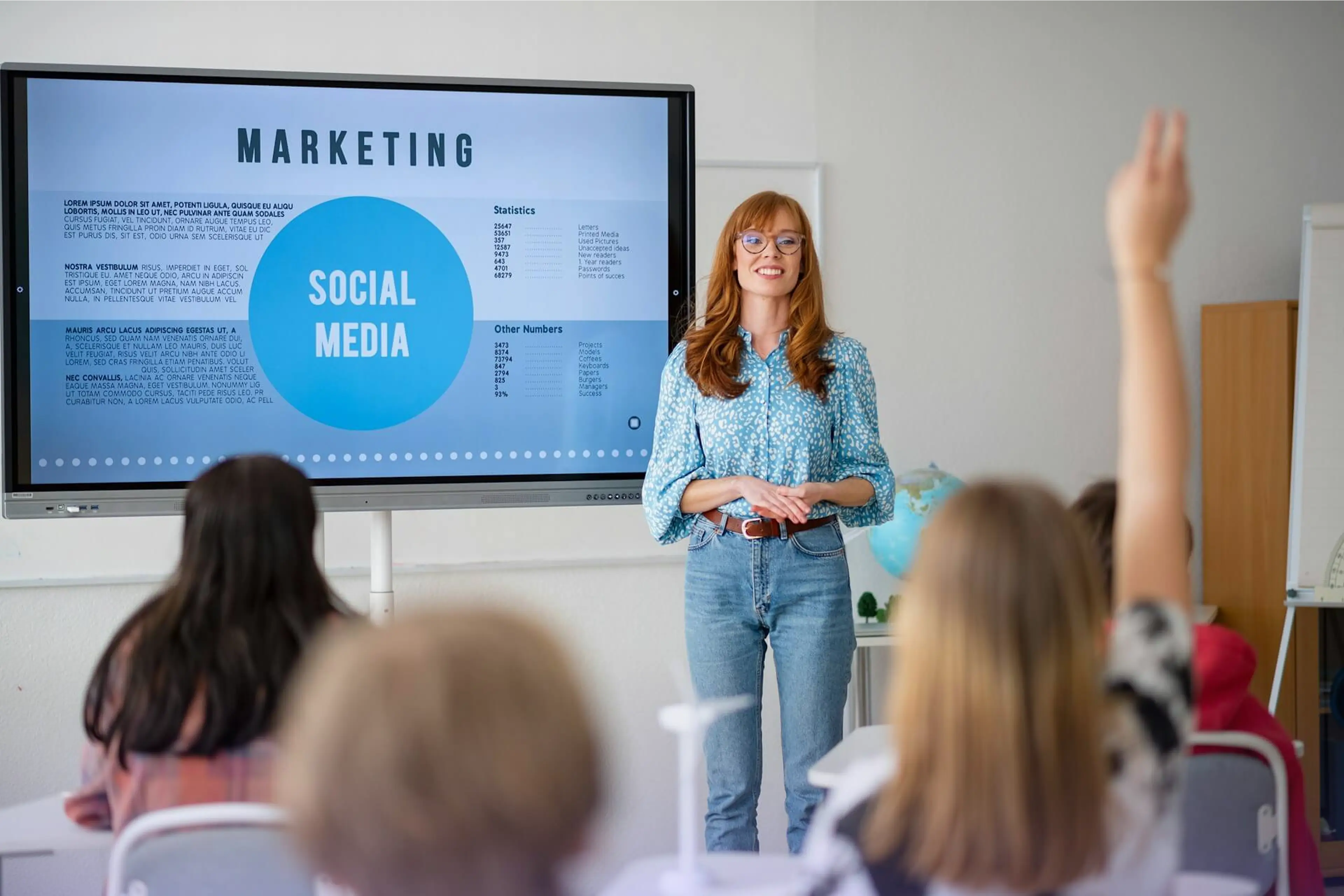 Woman presenting a social media marketing slide