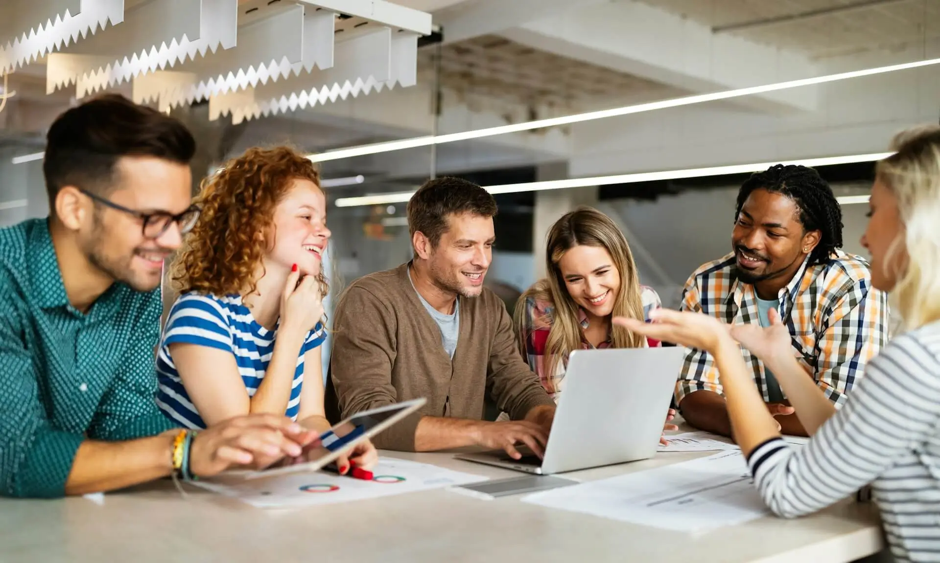 Team collaborating on strategy and design during a brand refresh planning