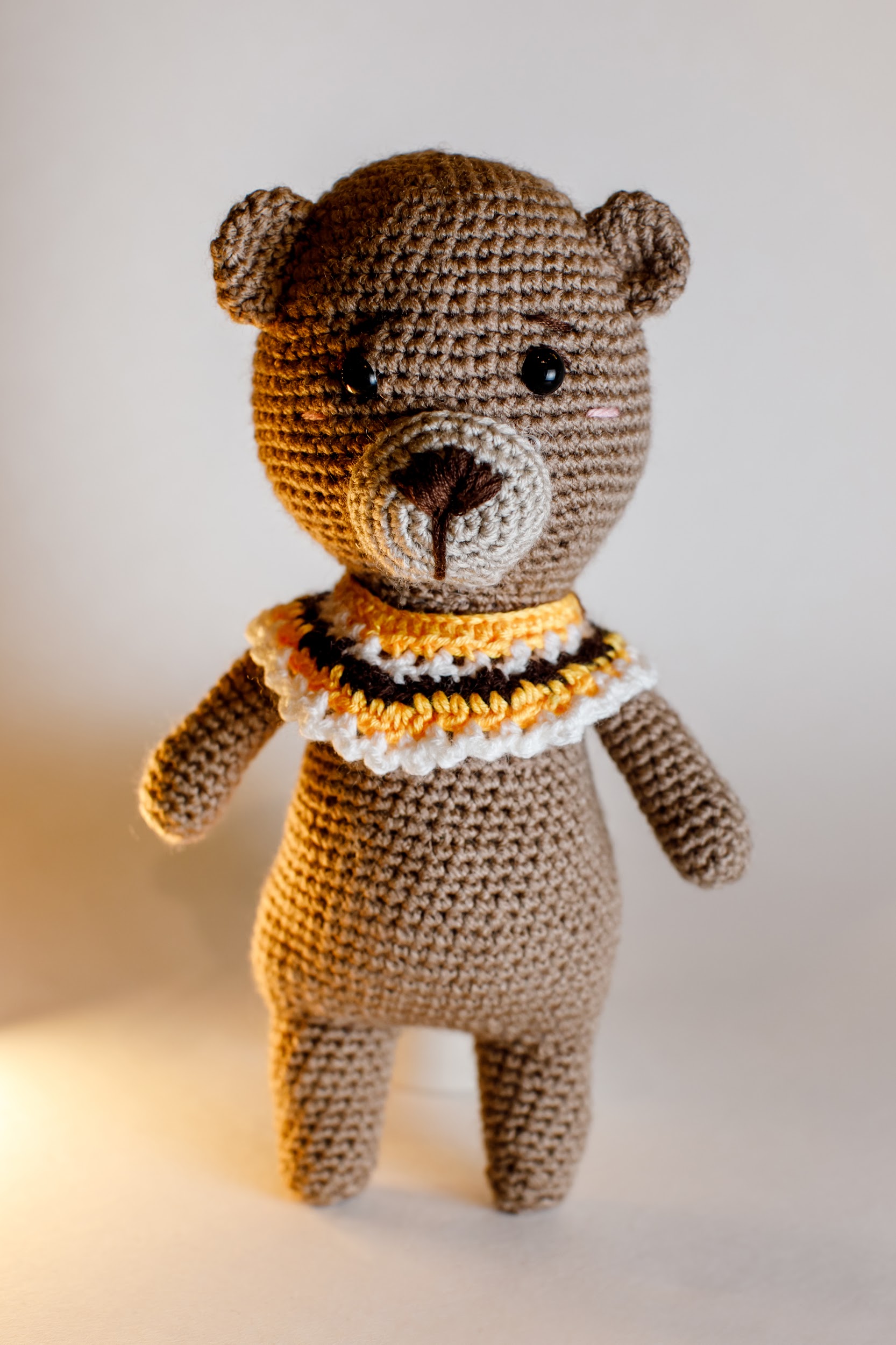 Bear in poncho