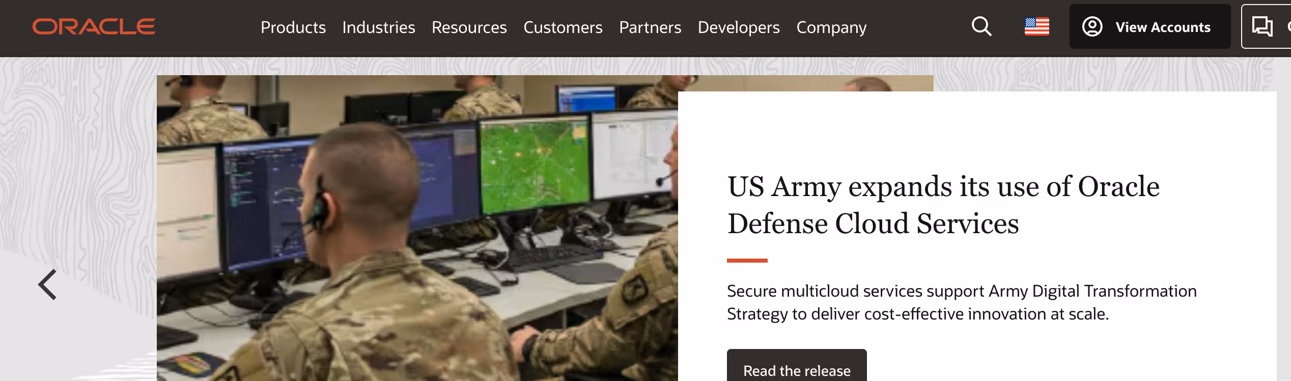 US Army personnel at computer stations. Text: US Army expands use of Oracle Defense Cloud Services. Oracle logo.