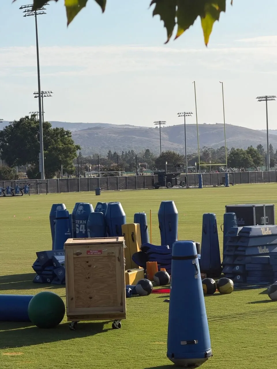 Pads and equipment staged on the field
