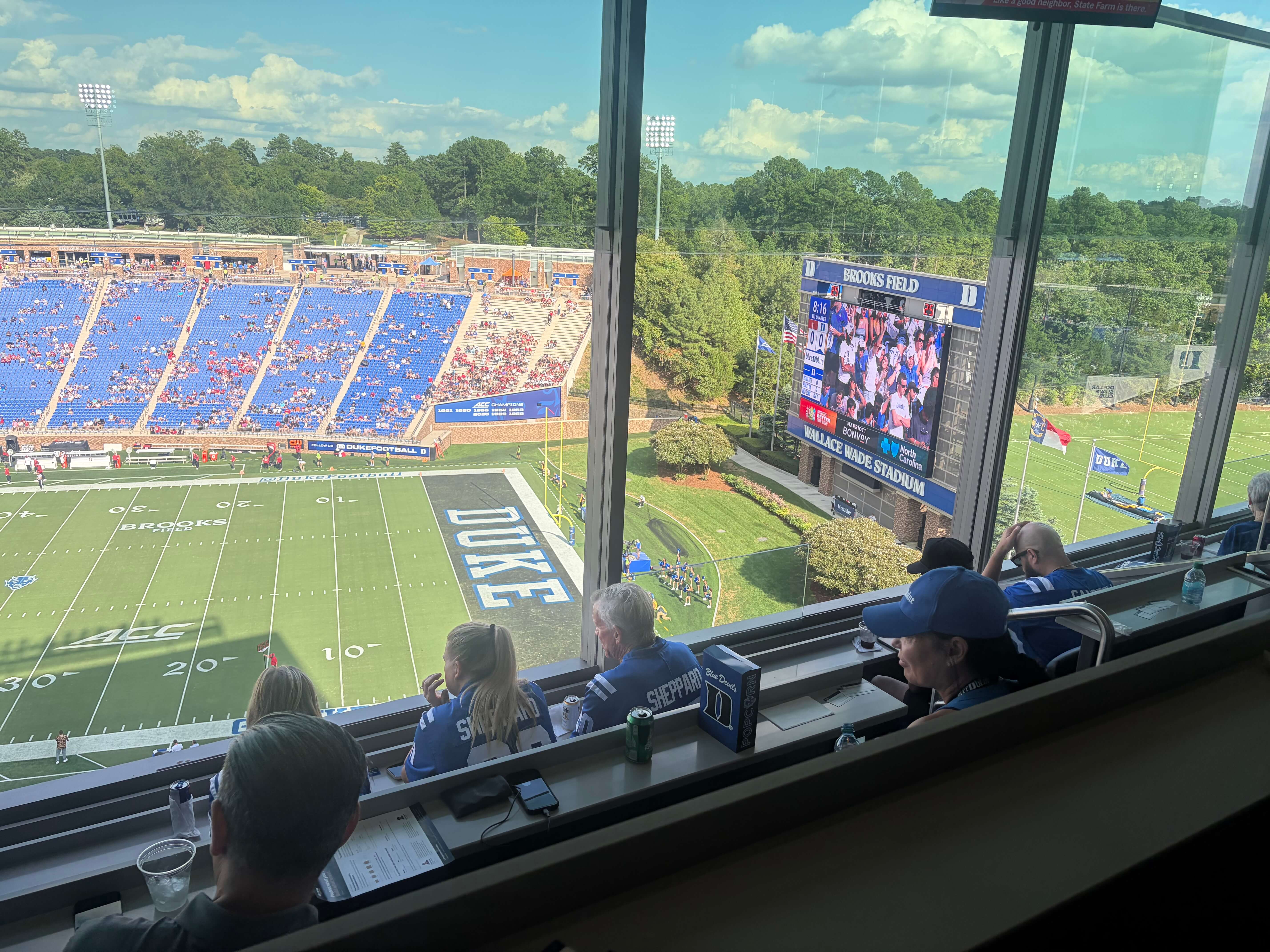 Families watching from the suite at Wallace Wade Stadium