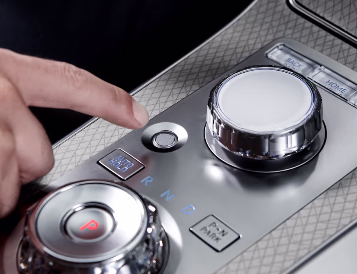 The Genesis integrated controller in the center console.