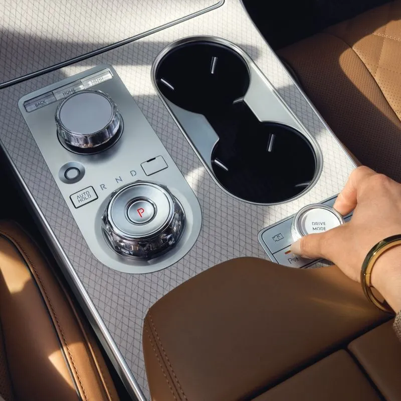 The Genesis integrated controller in the center console.