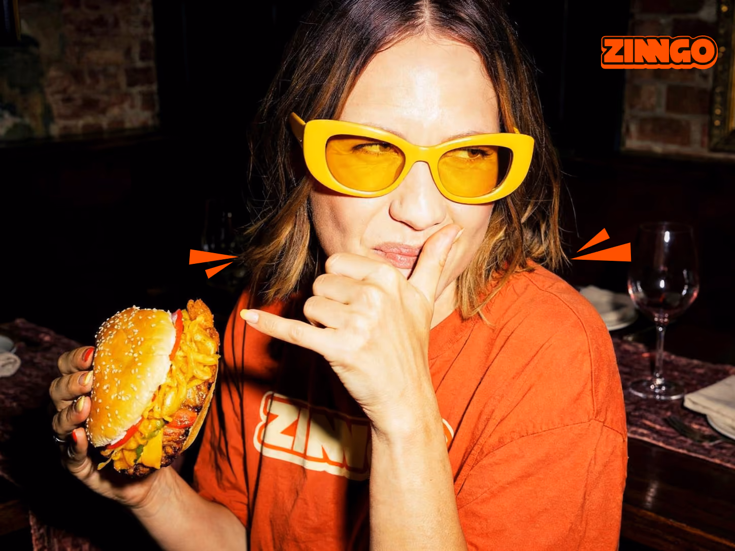 Zingo burger brand campaign with person in yellow sunglasses