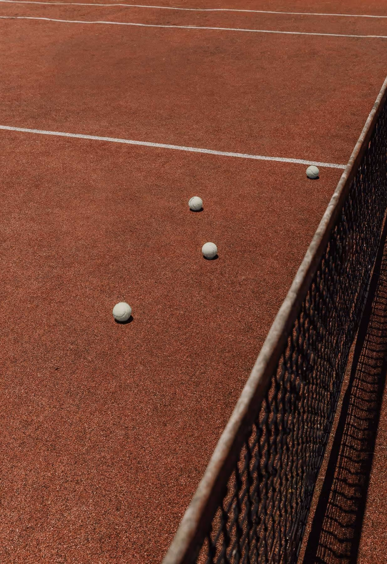 Balls on tennis court