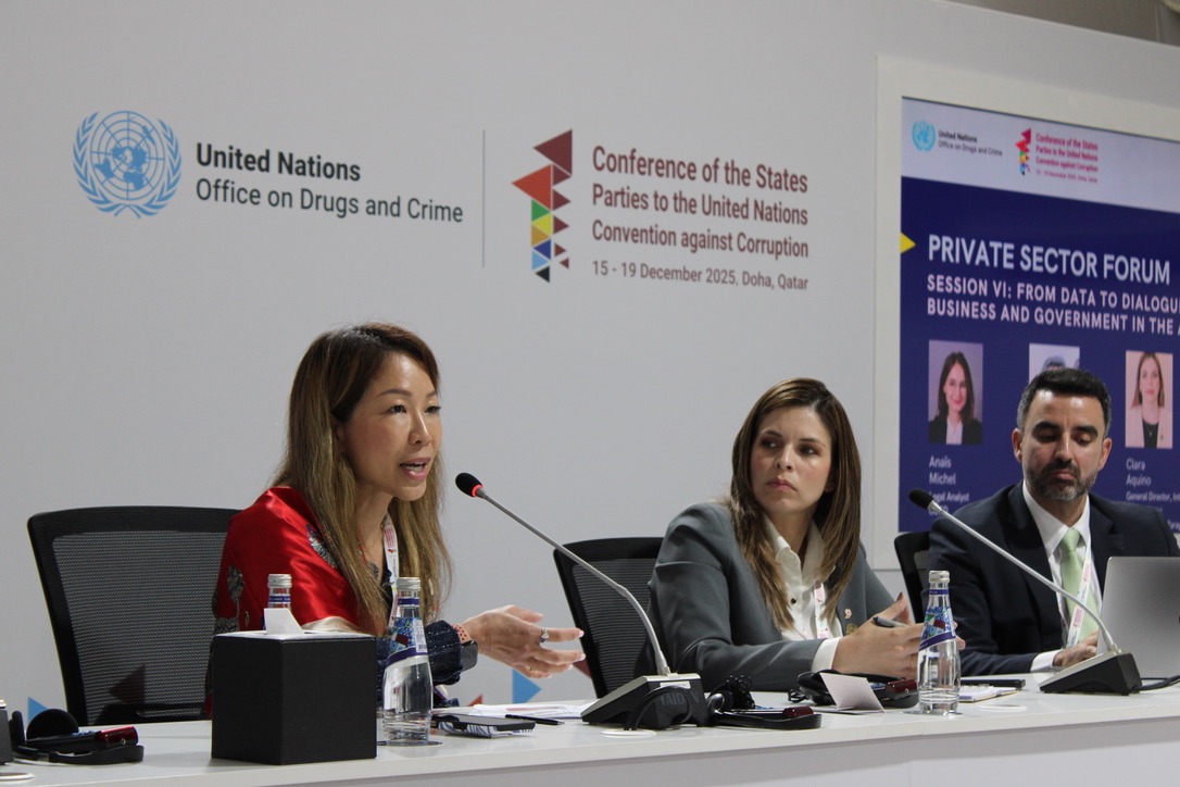Panel with backdrop of UNODC at COSP11