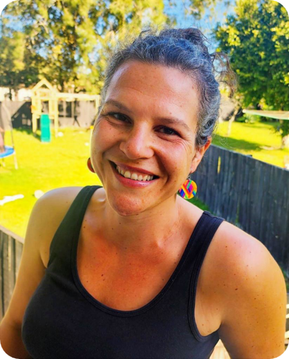 Branka Bogdan standing in front of a sun drenched yard