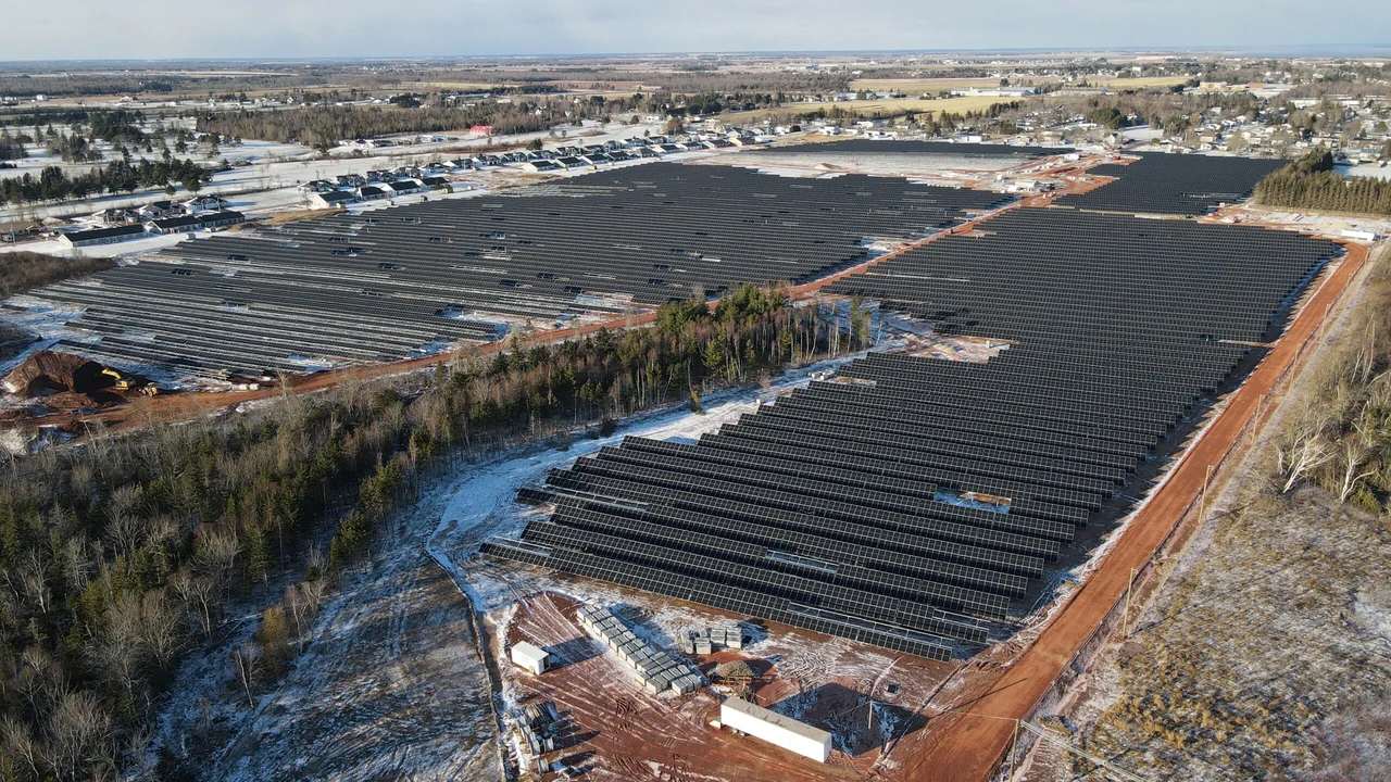 Solar farm in Prince Edward Island featuring rows of solar panels, highlighting renewable energy development and sustainability initiatives in Atlantic Canada.