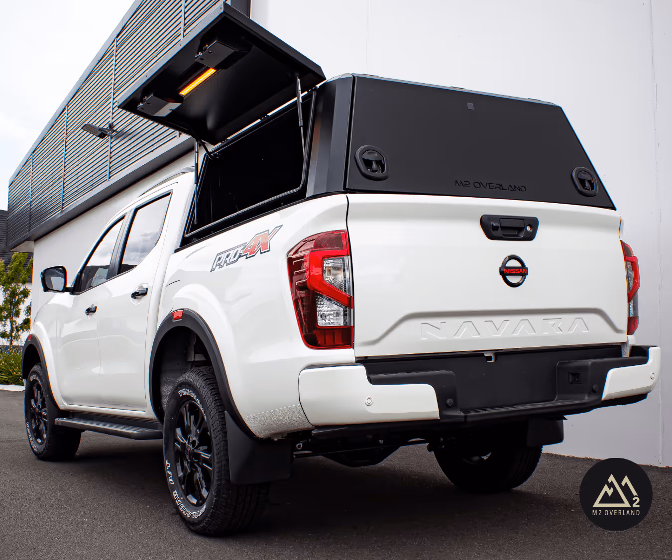 nissan navara with wellside canopy