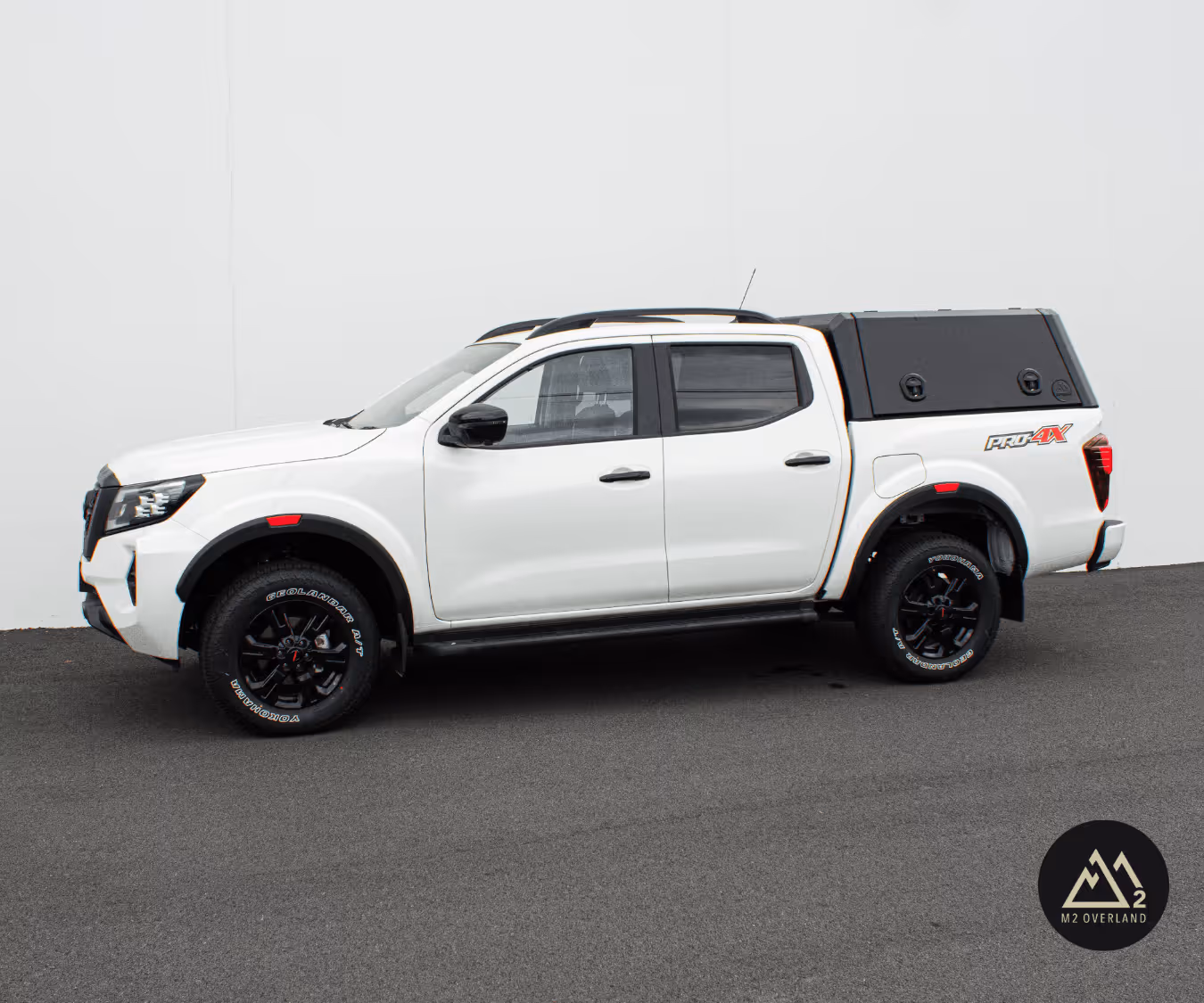 nissan navara with wellside canopy