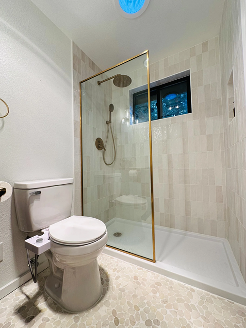 Master bathroom tub to shower remodel with glass enclosure and shower base