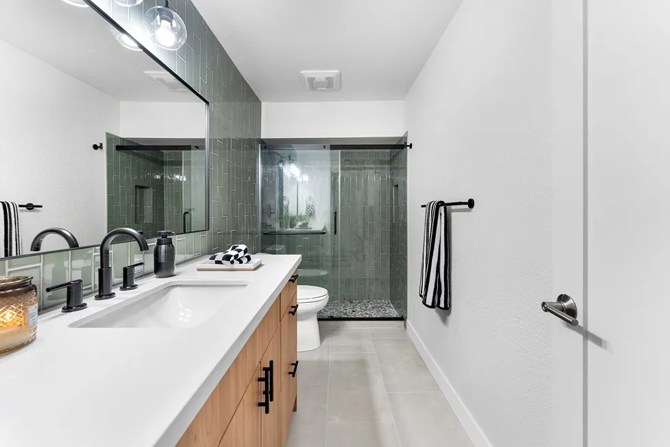 Shower remodel in Bothell with grab bars for aging homeowners