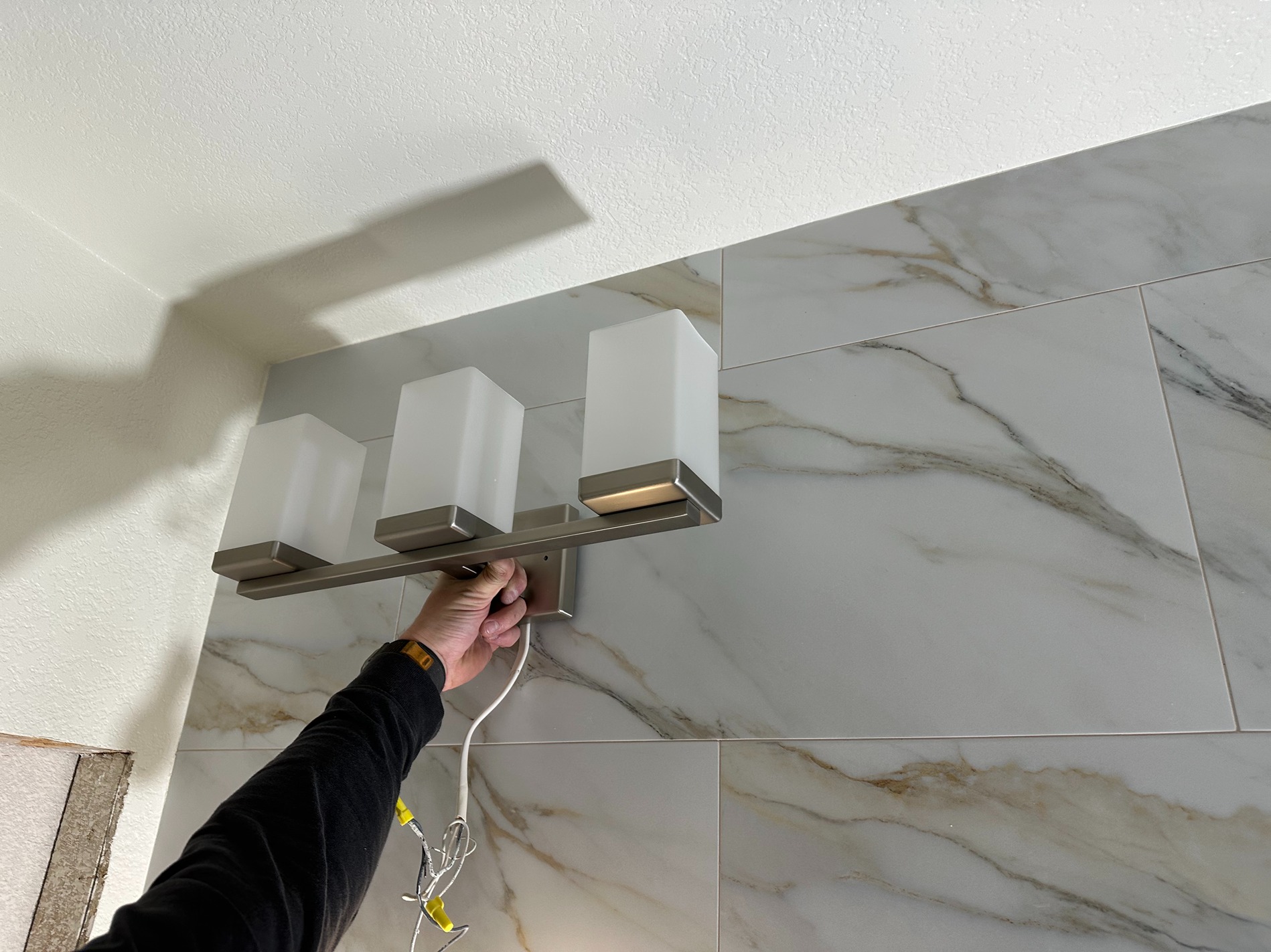 Combined Style and Comfort in a Sophisticated Bathroom Process Image 