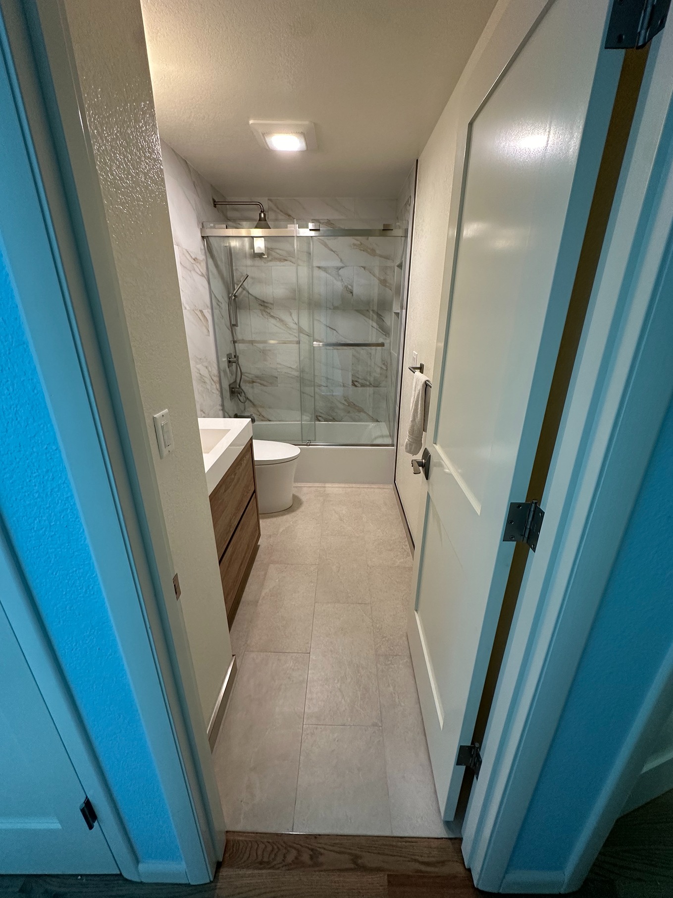 Combined Style and Comfort in a Sophisticated Bathroom Process Image 