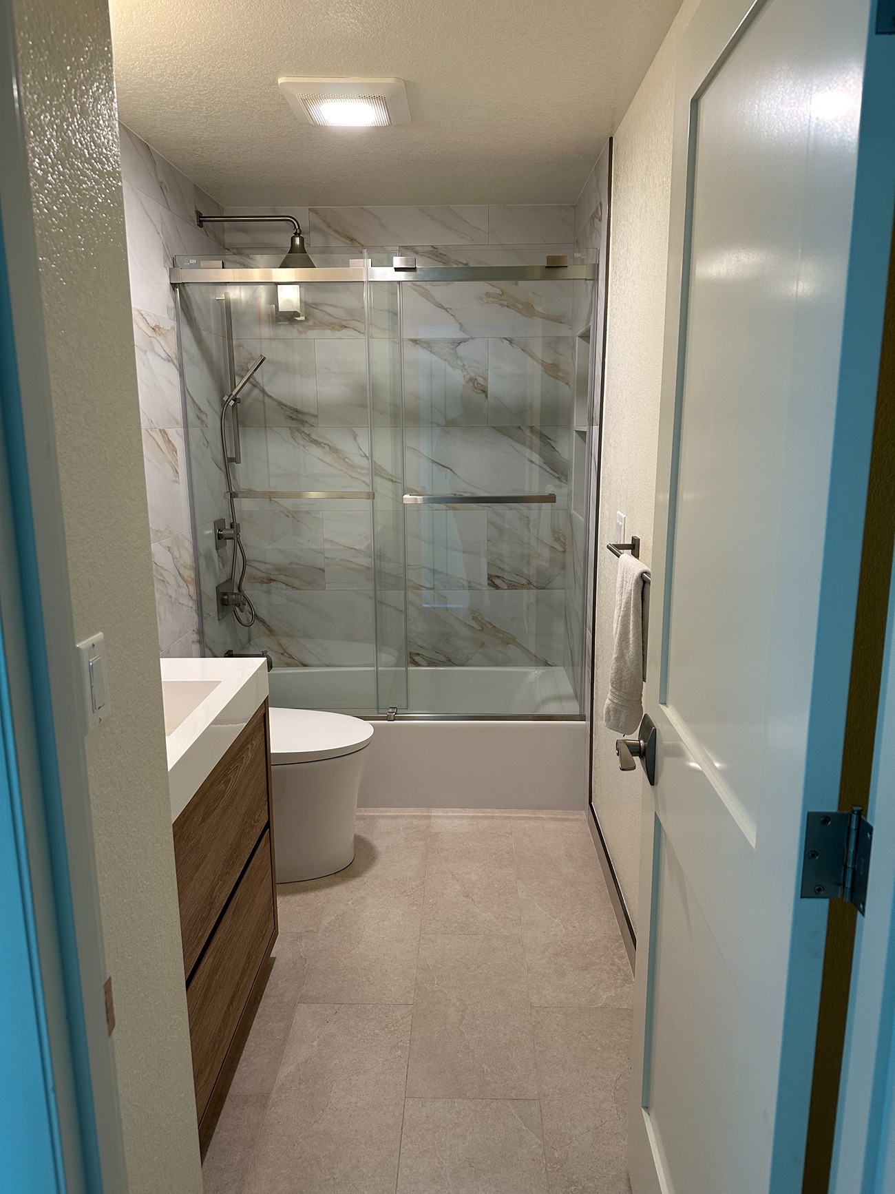 Combined Style and Comfort in a Sophisticated Bathroom Process Image 