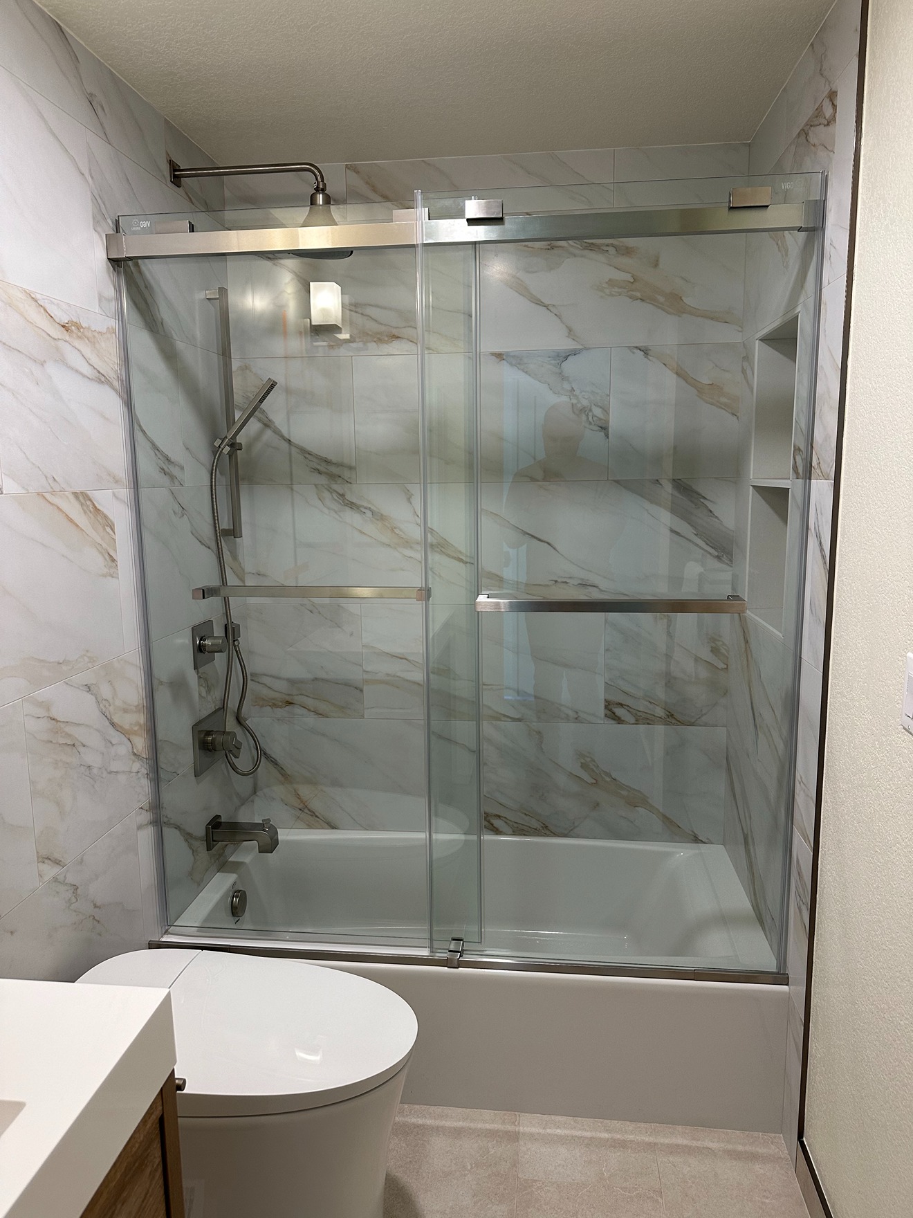 Combined Style and Comfort in a Sophisticated Bathroom Process Image 