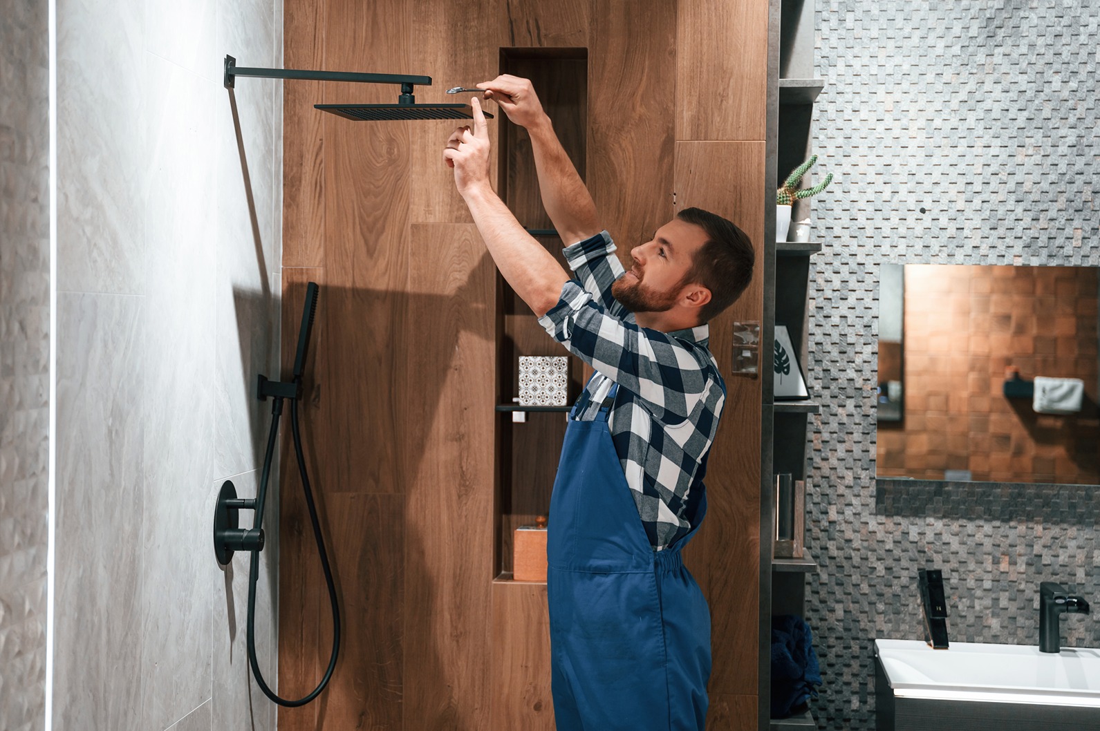 A bathroom remodeling contractor in Bothell during walk-in shower installation process