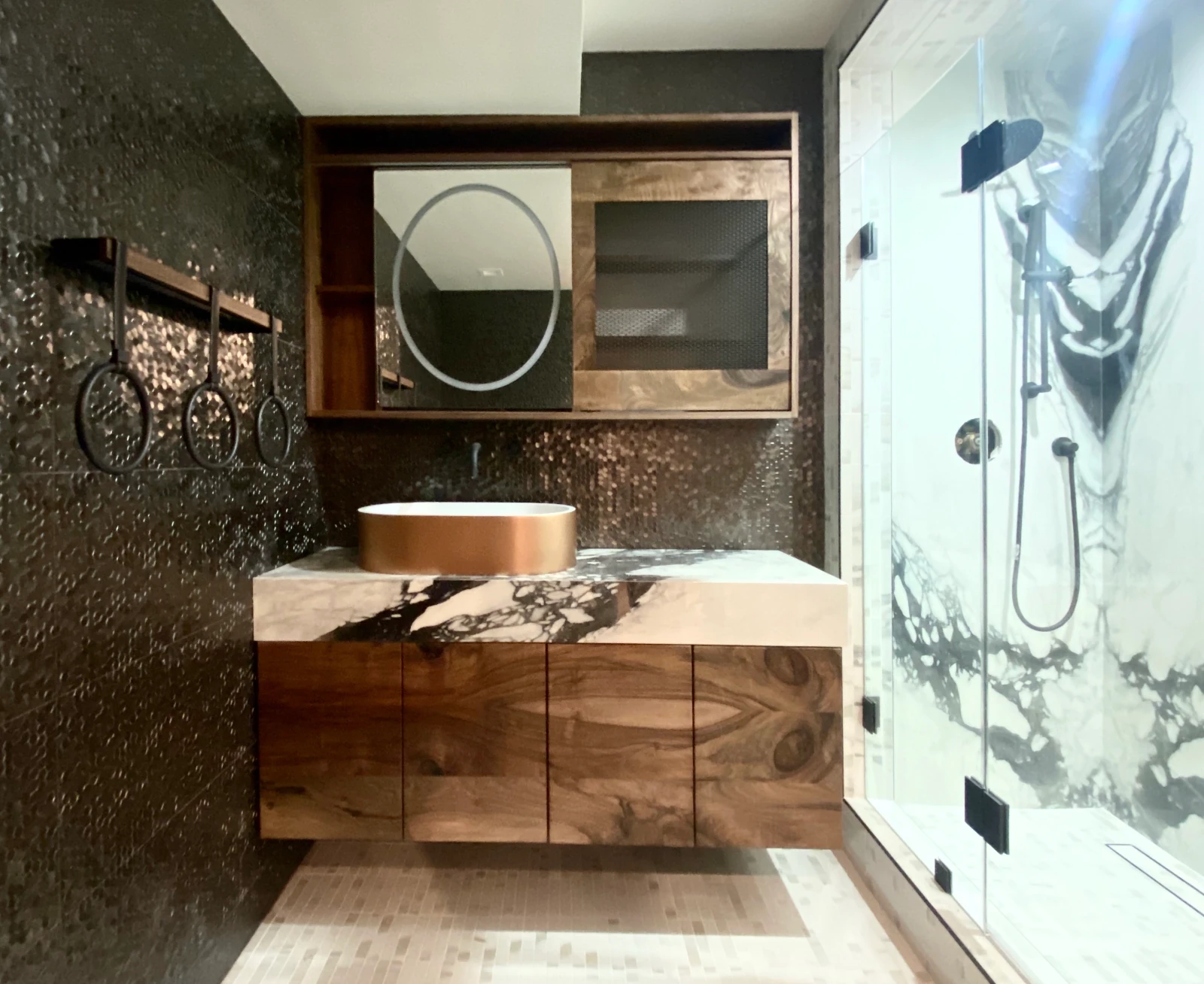Modern powder room vanity ideas including floating vanity and sculptural vessel sink in a Bothell half bath remodel