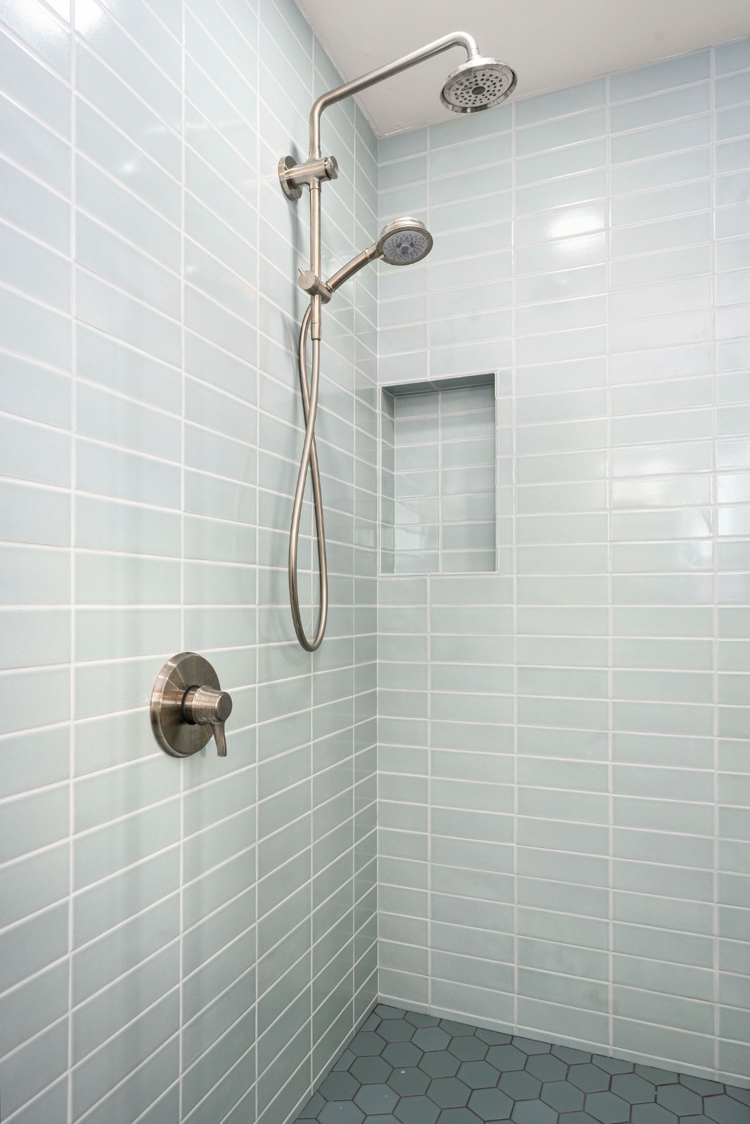 Bathroom tile grout detail on porcelain shower walls in a Bothell bathroom remodel