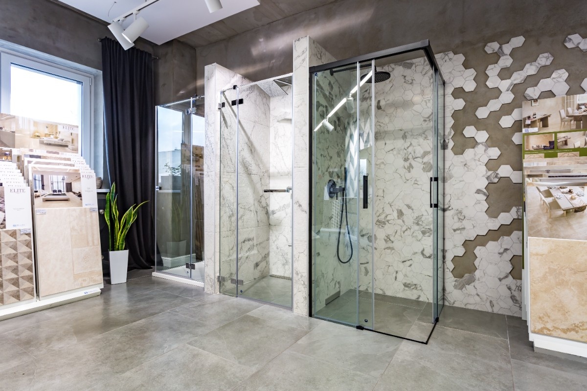 Porcelain tile vs natural stone cost and appearance comparison in a Bothell bathroom