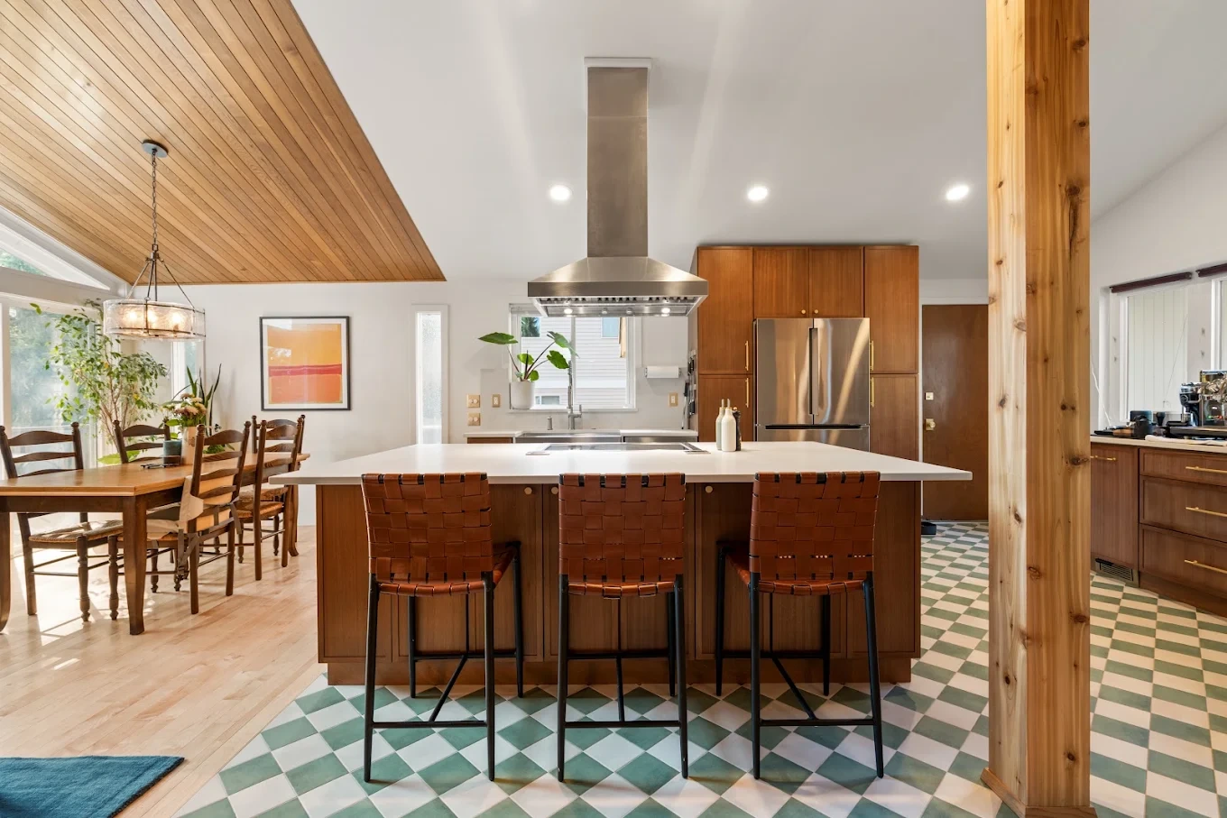Bright renovated kitchen with white countertops and open layout