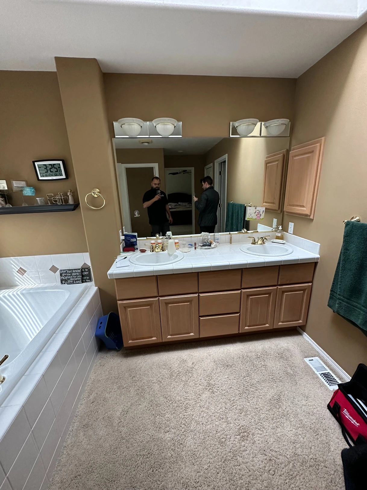 Dated bathroom interior before professional remodel begins
