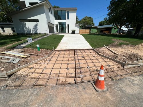 Concrete driveway approach prep with forms and base work by Angels View Construction in Austin, Texas