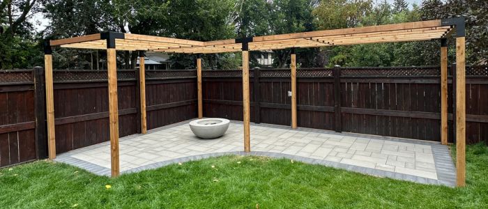 Calgary backyard pergola with privacy features and outdoor dining space
