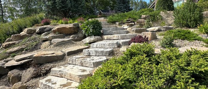 Natural stone steps landscaping Calgary backyard grade change