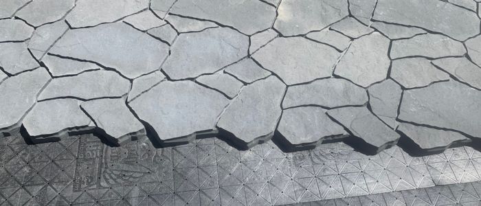 Western Elements Landscaping crew natural flagstone installation Calgary