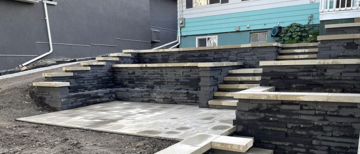 Paving stone patio retaining wall steps Calgary phase one landscaping